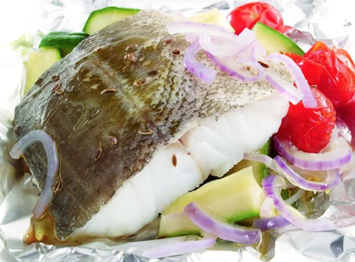 filete de bacalao en Papillote con crema de guisantes